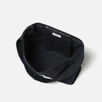The HBT NEWSPAPER BAG BLACK available online with global shipping, and in PAM Stores Melbourne and Sydney.