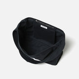 The HBT NEWSPAPER BAG BLACK available online with global shipping, and in PAM Stores Melbourne and Sydney.