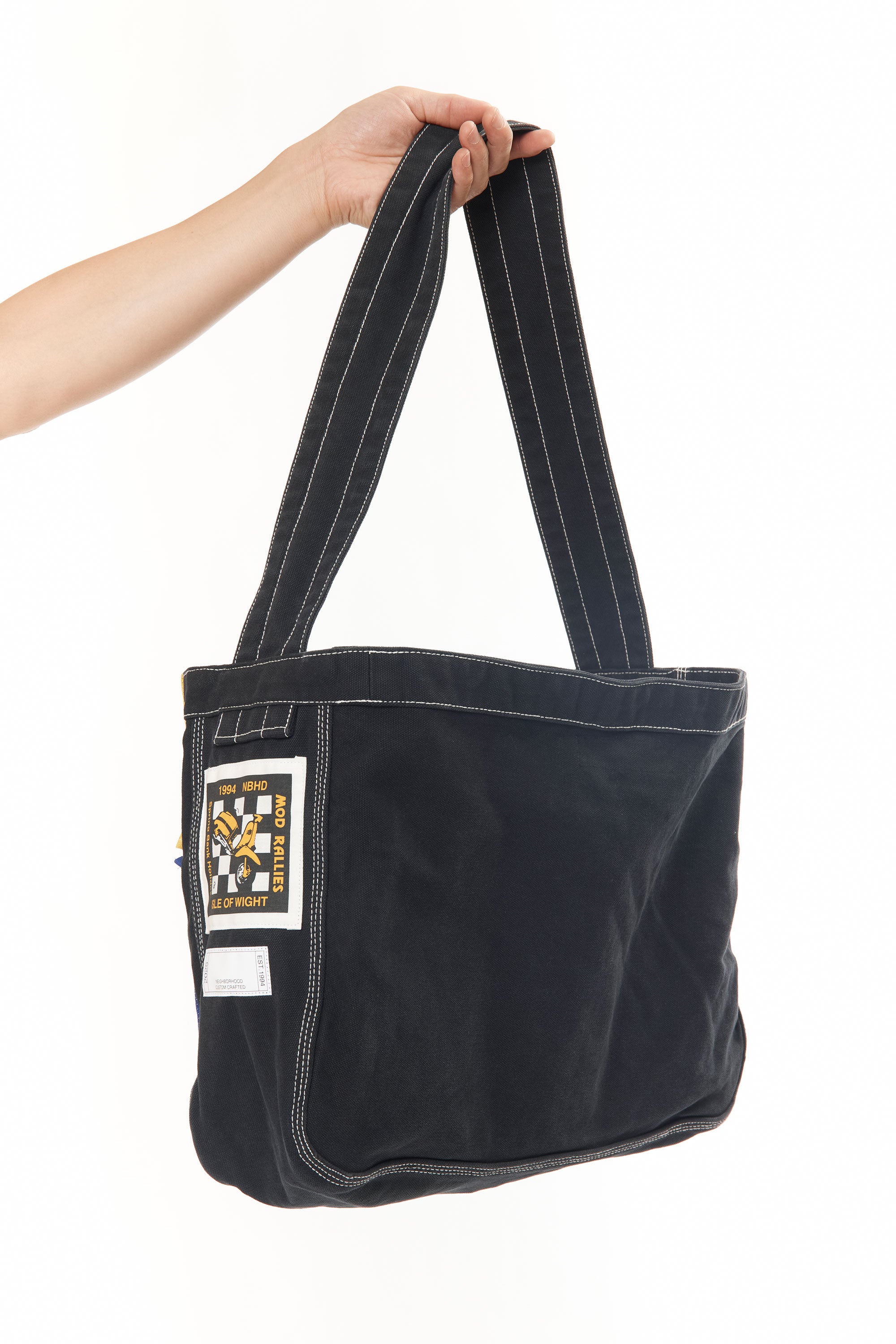 The NEWSPAPER SHOULDER BAG MOD BLACK available online with global shipping, and in PAM Stores Melbourne and Sydney.