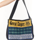 The NEWSPAPER SHOULDER BAG MOD BLACK available online with global shipping, and in PAM Stores Melbourne and Sydney.