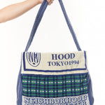 The NEWSPAPER SHOULDER BAG MOD BLUE available online with global shipping, and in PAM Stores Melbourne and Sydney.