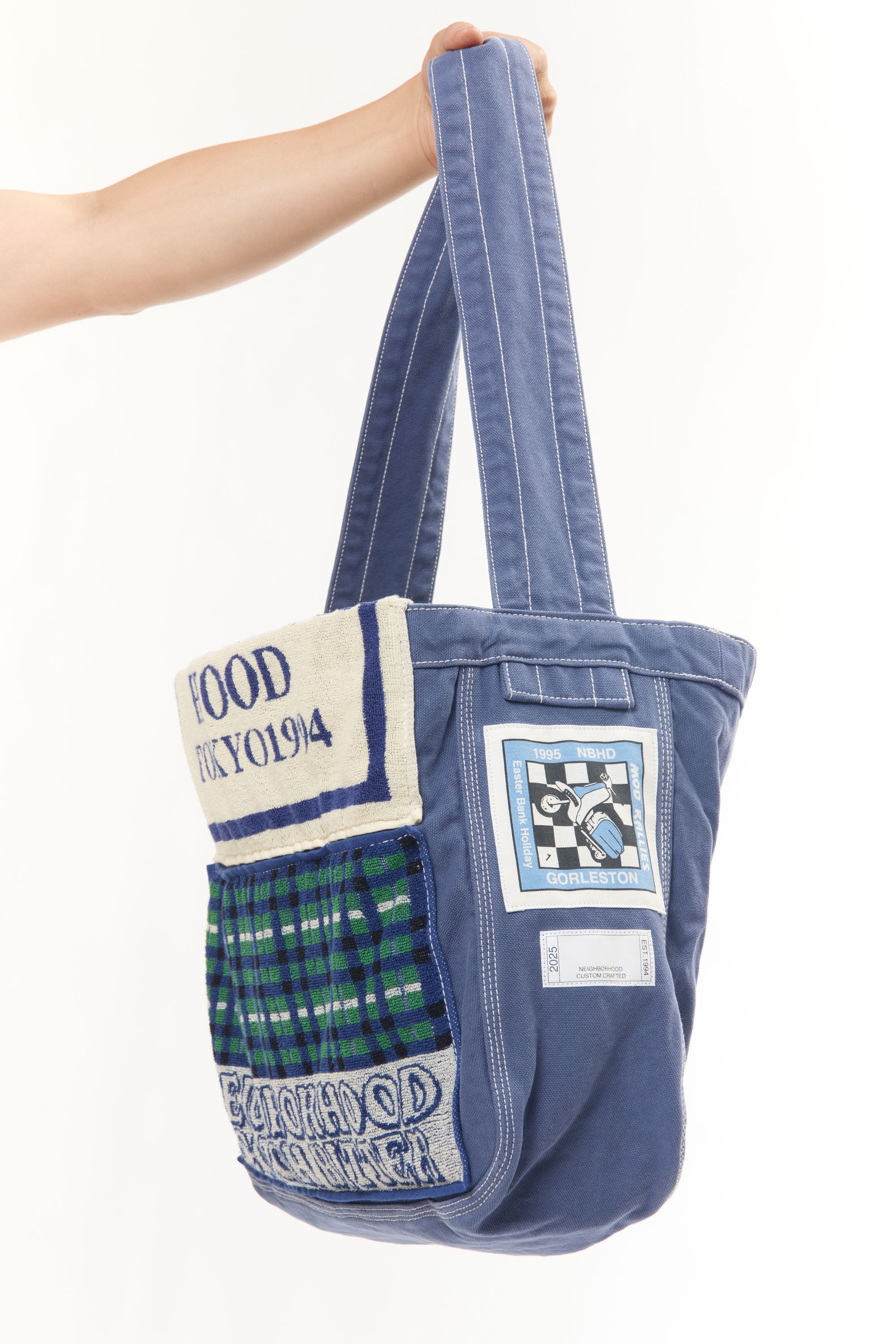 The NEWSPAPER SHOULDER BAG MOD BLUE available online with global shipping, and in PAM Stores Melbourne and Sydney.