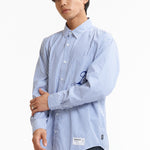 The SS26 NH STRIPE SHIRT LS BLUE available online with global shipping, and in PAM Stores Melbourne and Sydney.