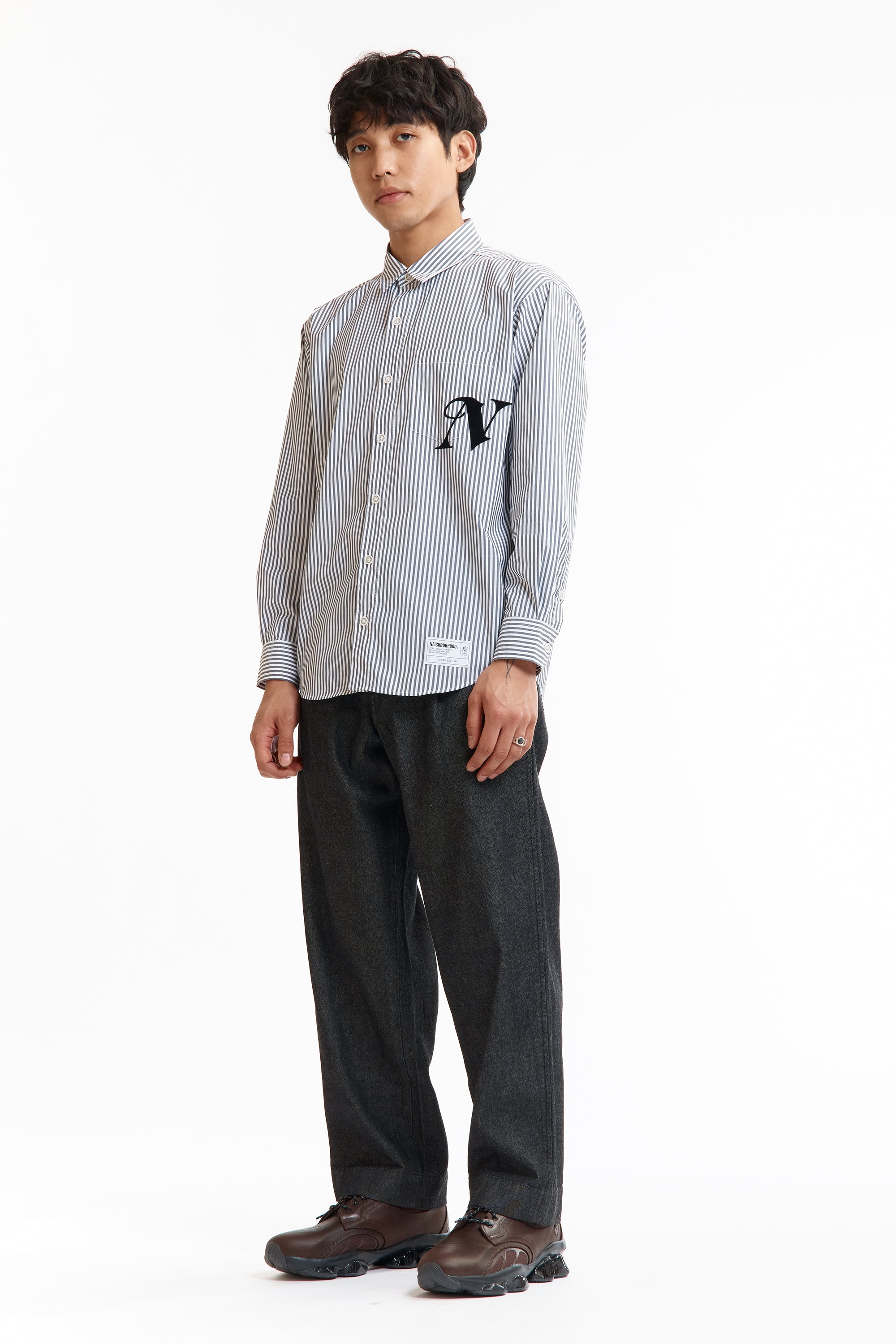 The SS26 NH STRIPE SHIRT LS BLACK available online with global shipping, and in PAM Stores Melbourne and Sydney.