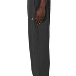 The Numb Pinstriped Packable Pants Black available online with global shipping, and in PAM Stores Melbourne and Sydney.