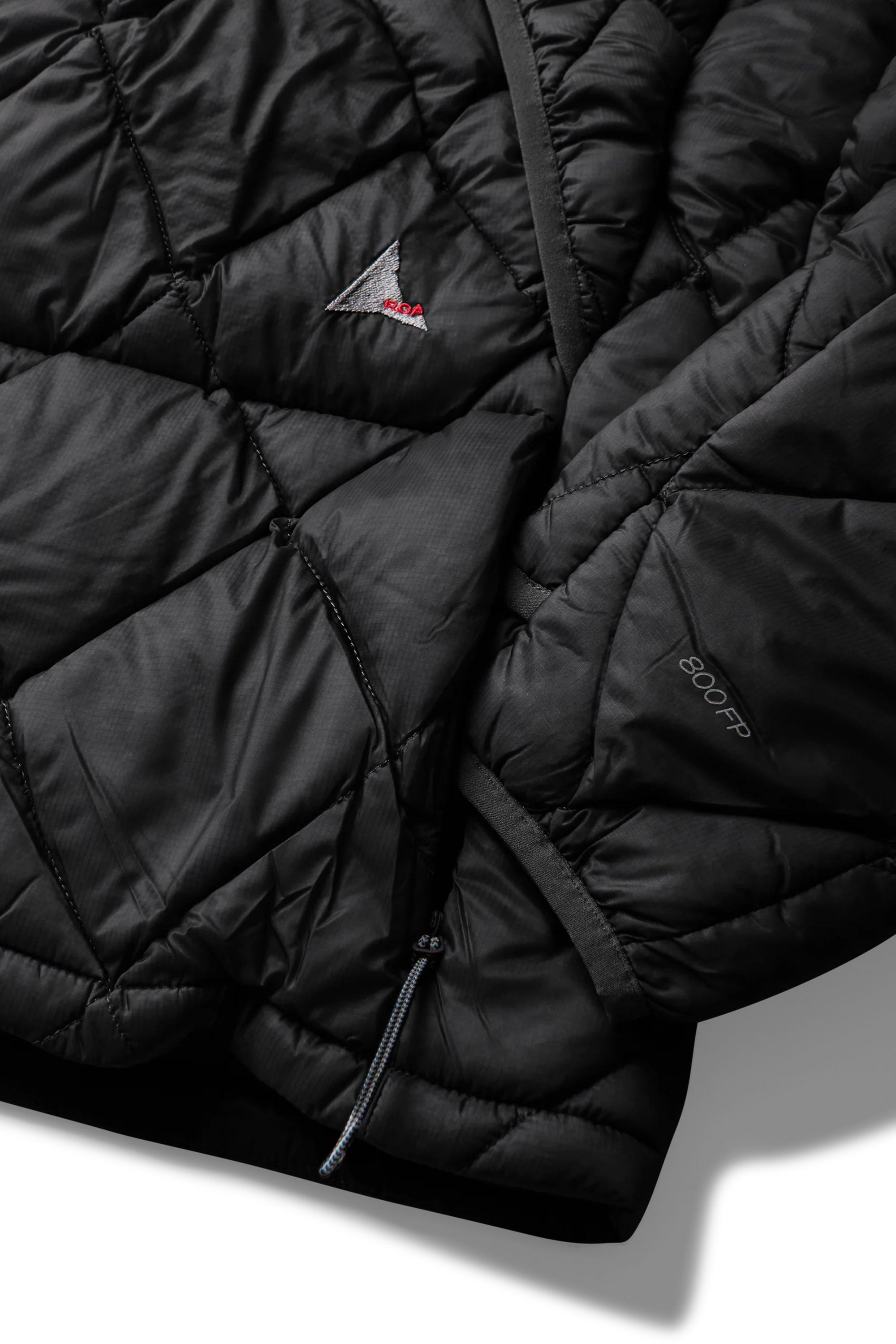 The Nuna 800 Fill Power Hooded Down Jacket Black available online with global shipping, and in PAM Stores Melbourne and Sydney.