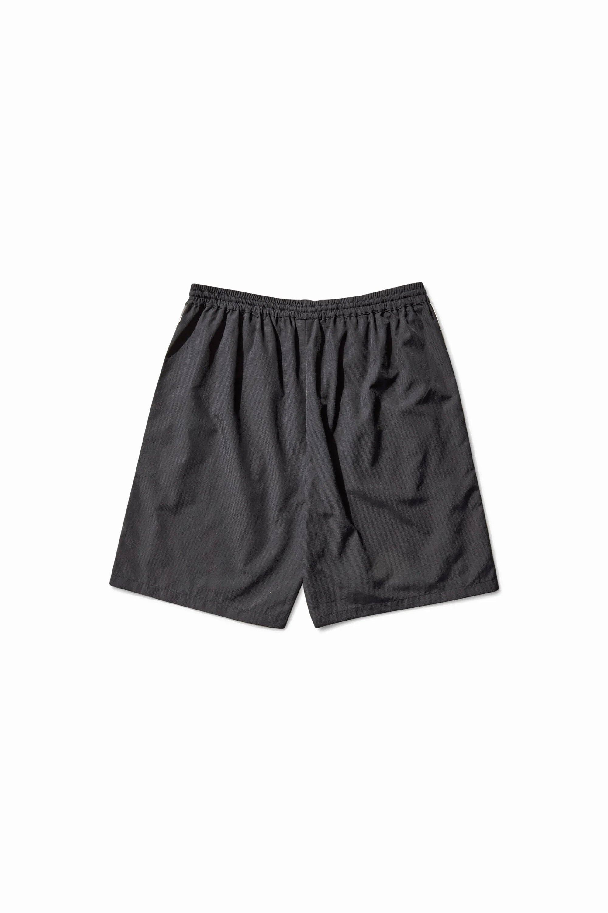 The Og Taped Shorts Carbon Black available online with global shipping, and in PAM Stores Melbourne and Sydney.