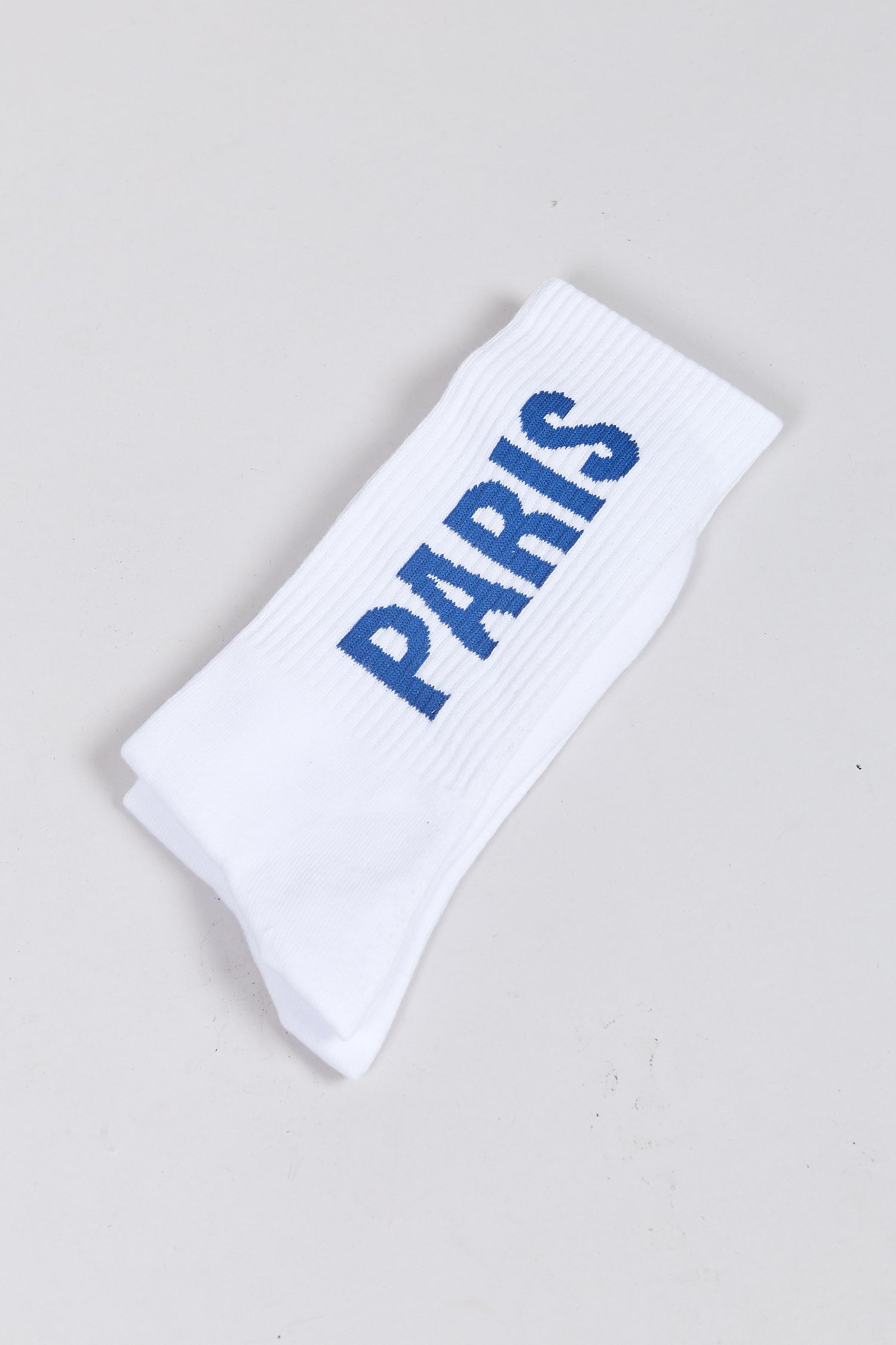 The PARIS, TEXAS SOCKS WHITE  available online with global shipping, and in PAM Stores Melbourne and Sydney.