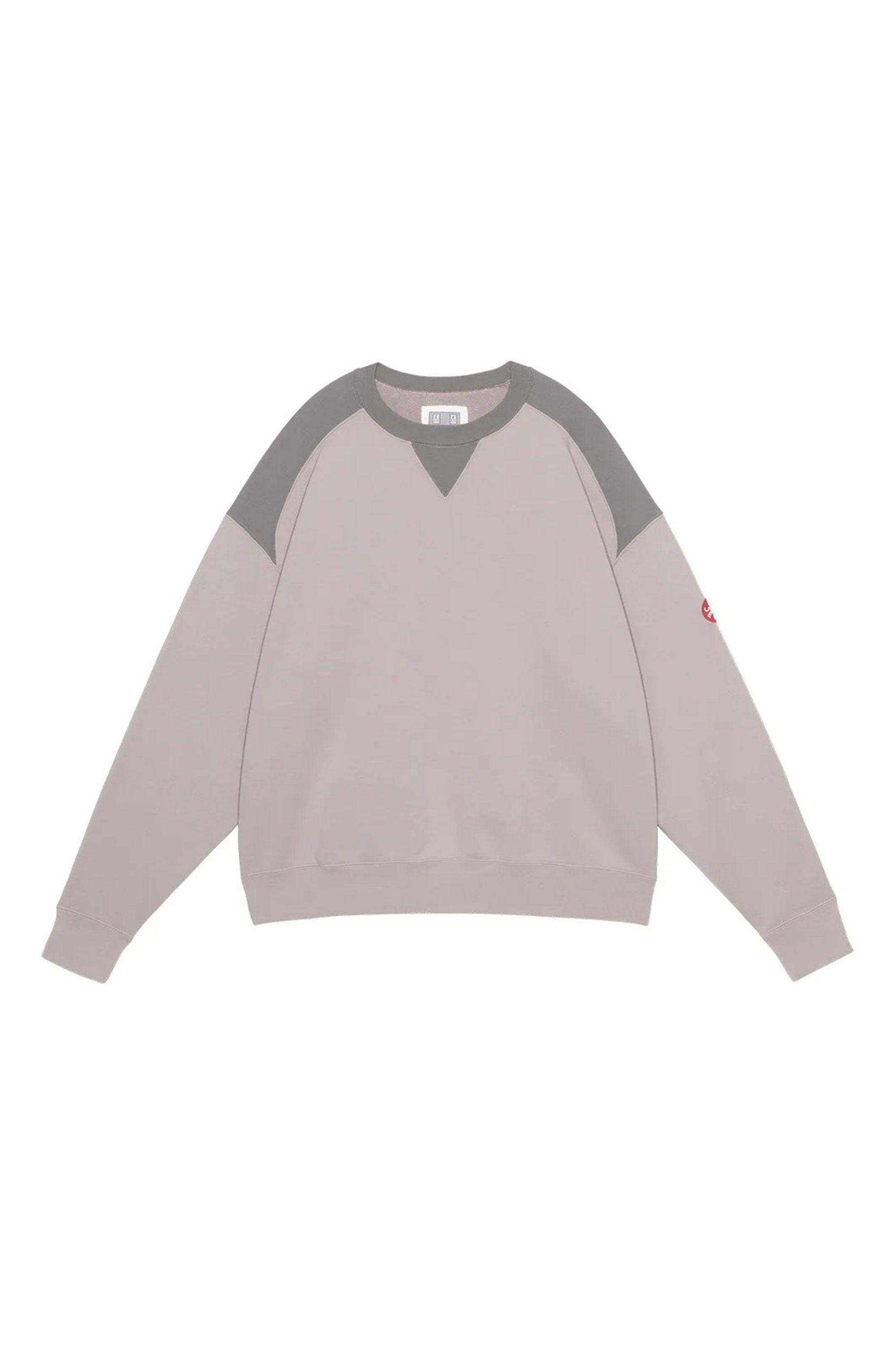 The PANEL SHOULDER CREW NECK BEIGE available online with global shipping, and in PAM Stores Melbourne and Sydney.