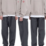 The PANEL SHOULDER CREW NECK BEIGE available online with global shipping, and in PAM Stores Melbourne and Sydney.