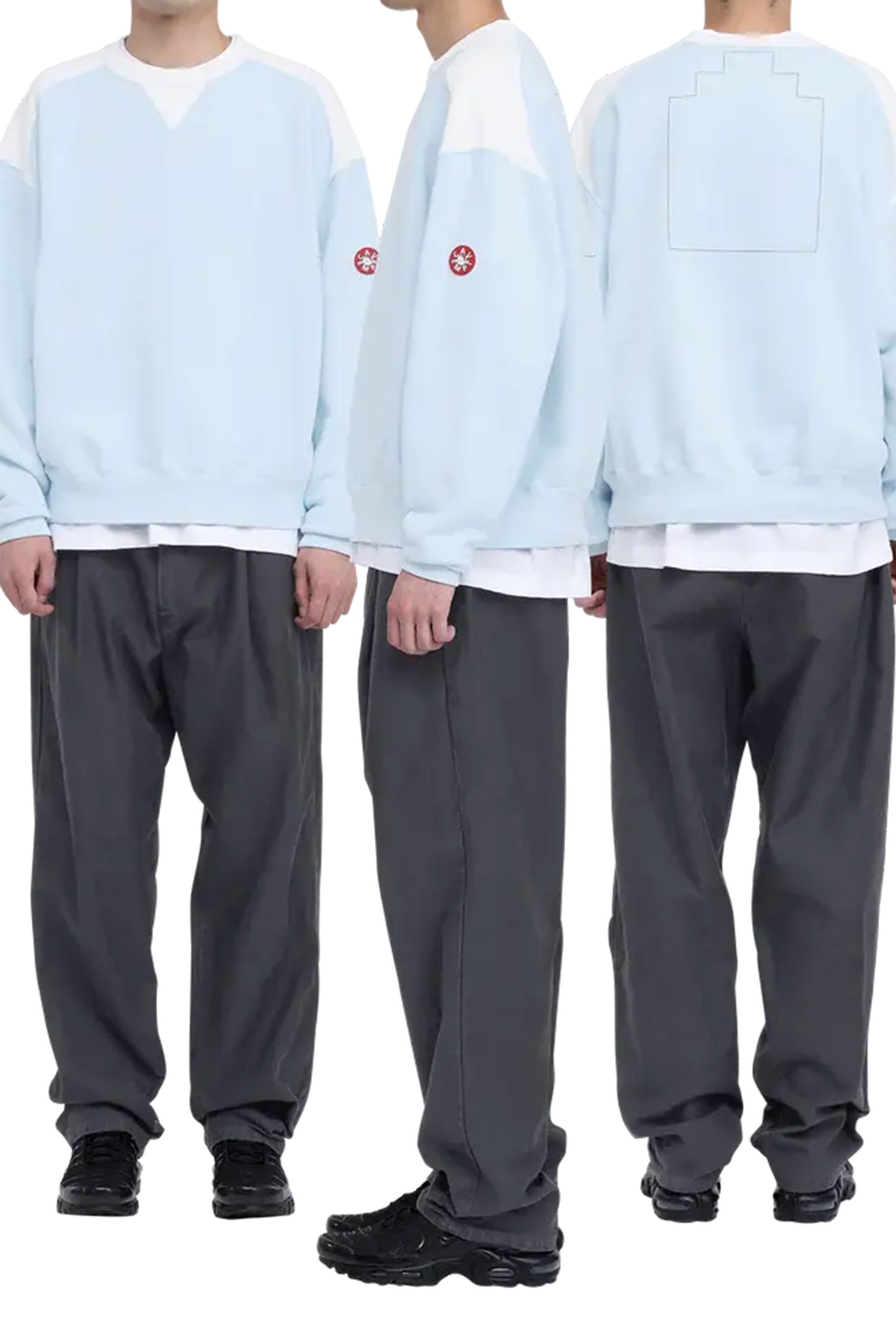 The PANEL SHOULDER CREW NECK BLUE available online with global shipping, and in PAM Stores Melbourne and Sydney.