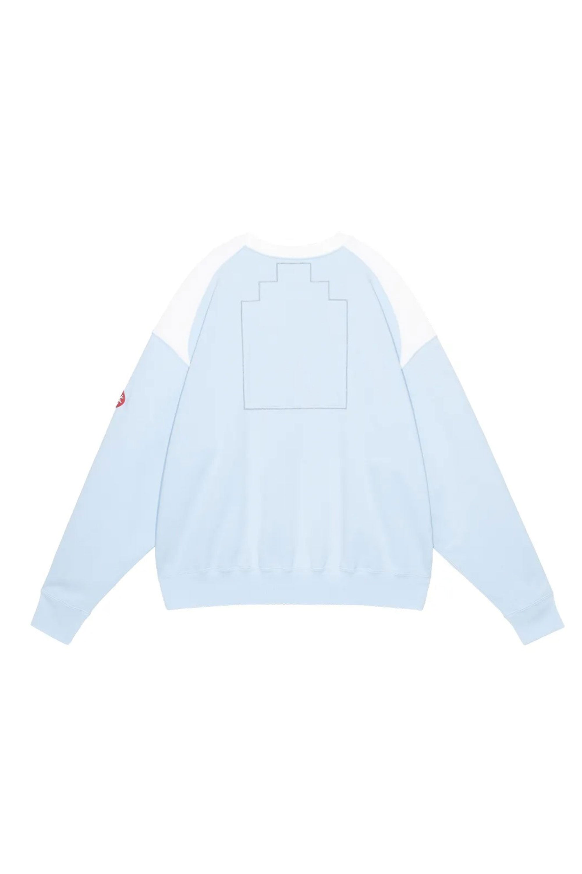 The PANEL SHOULDER CREW NECK BLUE available online with global shipping, and in PAM Stores Melbourne and Sydney.