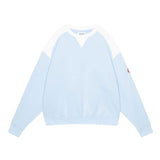 The PANEL SHOULDER CREW NECK BLUE available online with global shipping, and in PAM Stores Melbourne and Sydney.