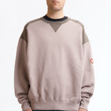 The PANEL SHOULDER CREW NECK BEIGE available online with global shipping, and in PAM Stores Melbourne and Sydney.
