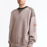 The PANEL SHOULDER CREW NECK BEIGE available online with global shipping, and in PAM Stores Melbourne and Sydney.
