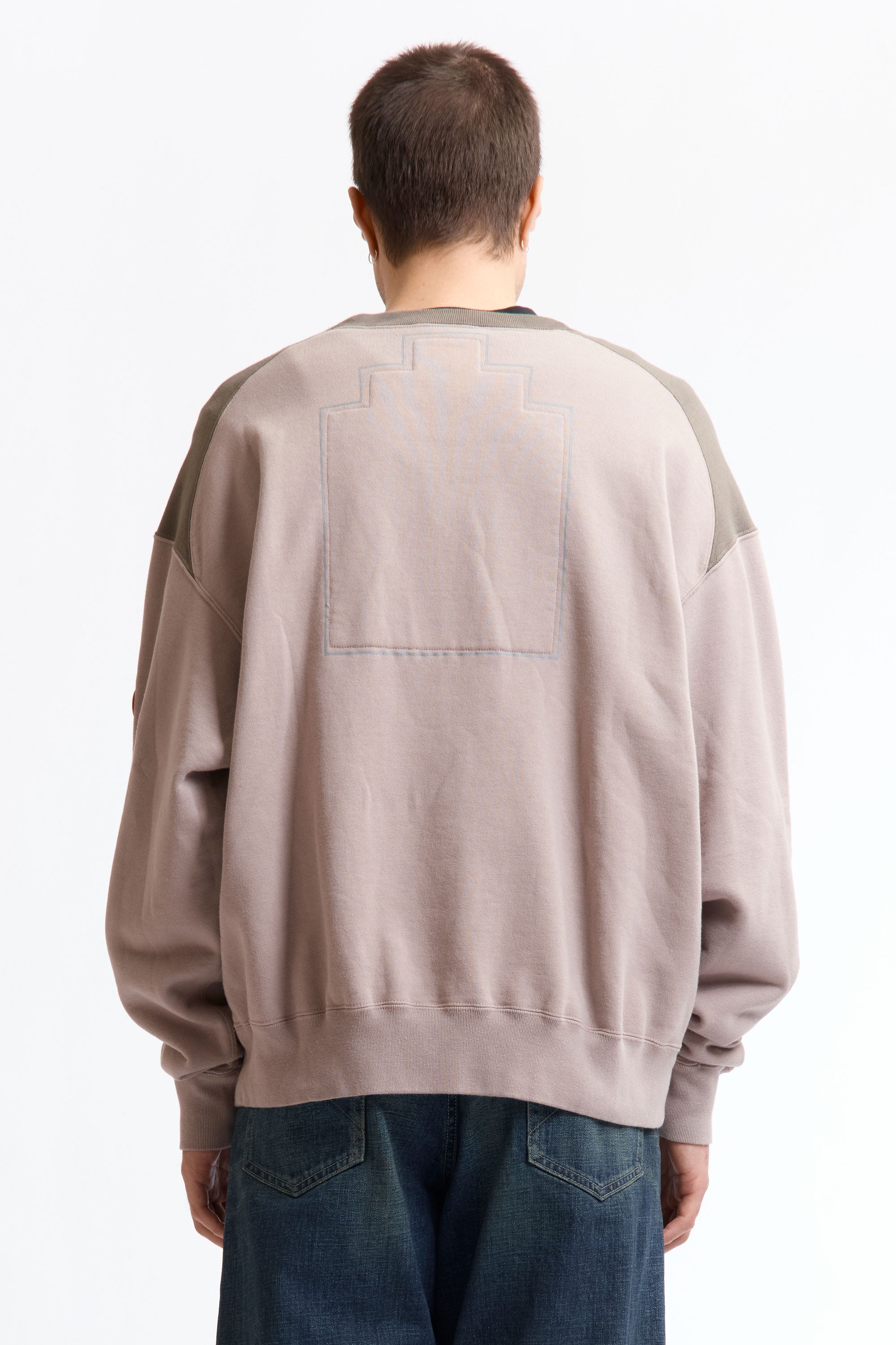 The PANEL SHOULDER CREW NECK BEIGE available online with global shipping, and in PAM Stores Melbourne and Sydney.