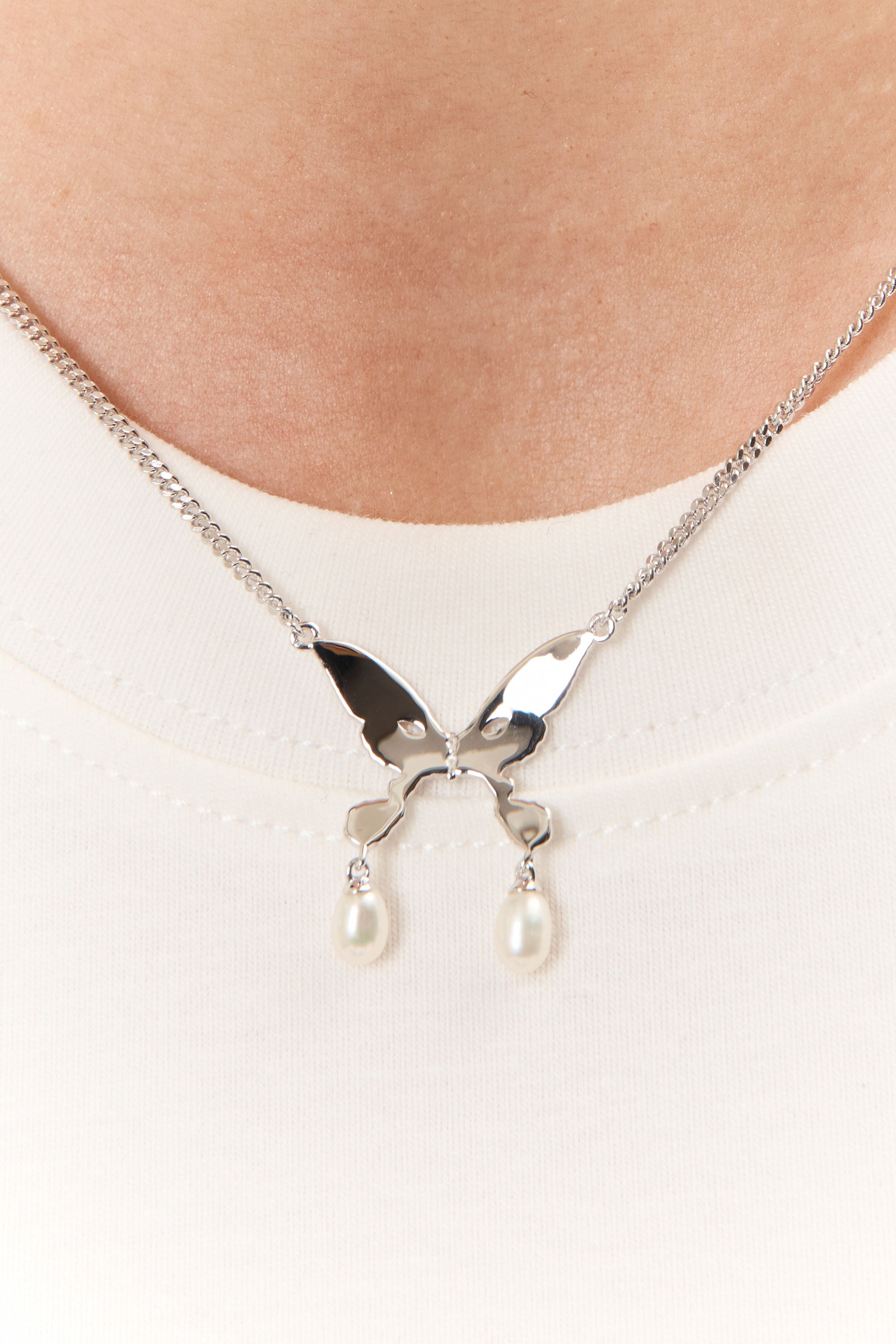 The PEARL DROP ALIEN KISS NECKLACE available online with global shipping, and in PAM Stores Melbourne and Sydney.