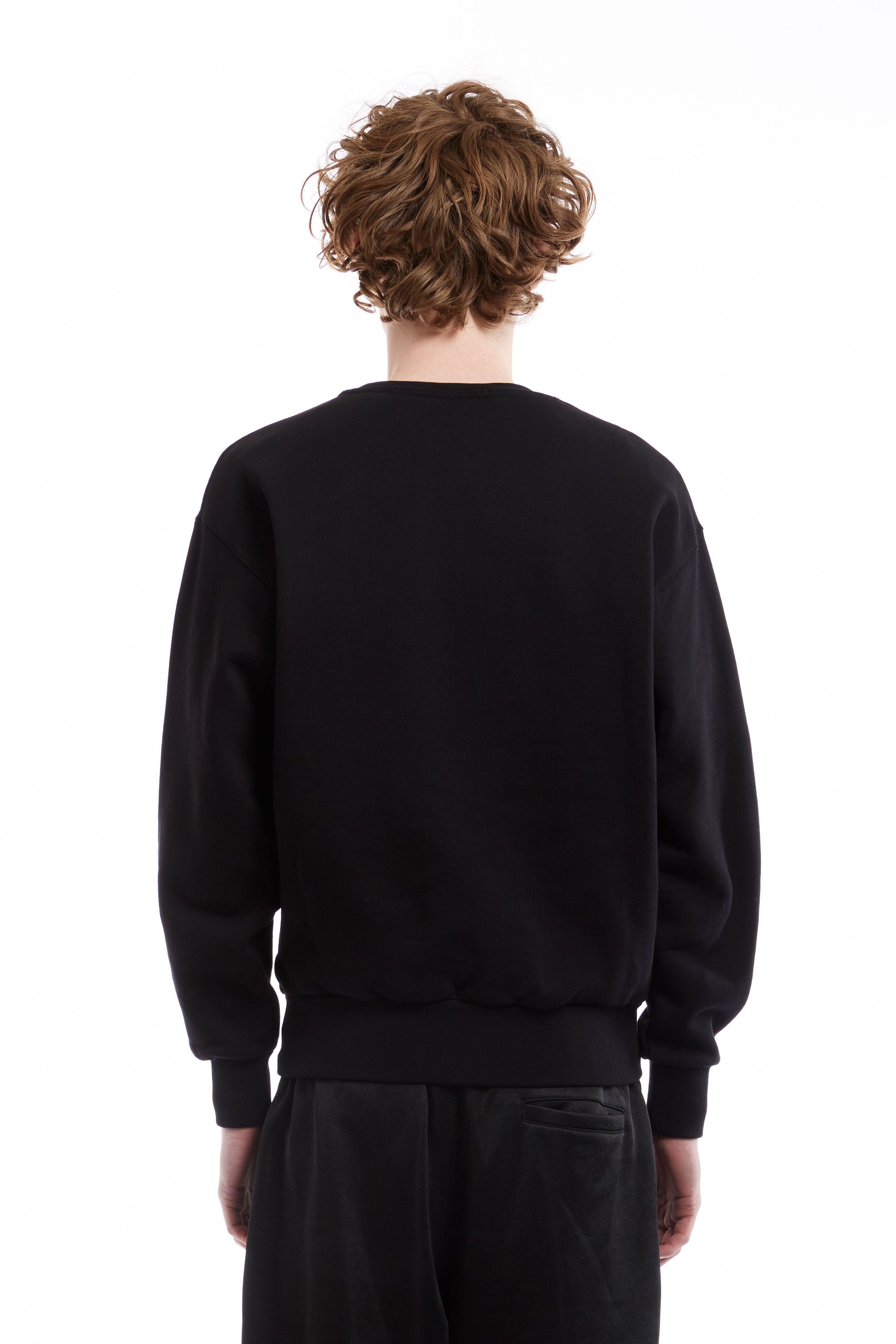 The PERFUME SWEAT BLACK  available online with global shipping, and in PAM Stores Melbourne and Sydney.