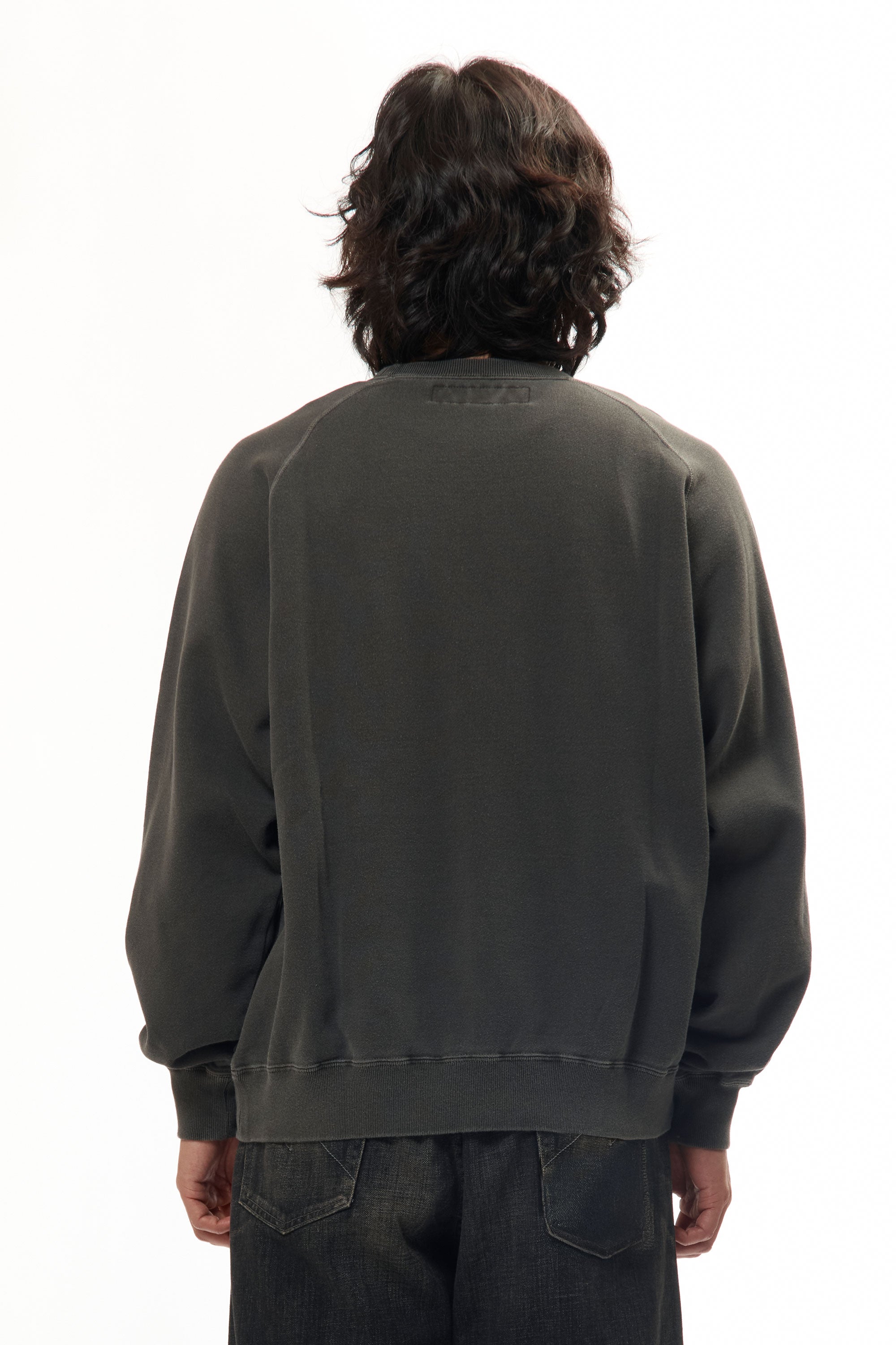 The PIGMENT DYED SWEAT SHIRT LS BLACK available online with global shipping, and in PAM Stores Melbourne and Sydney.