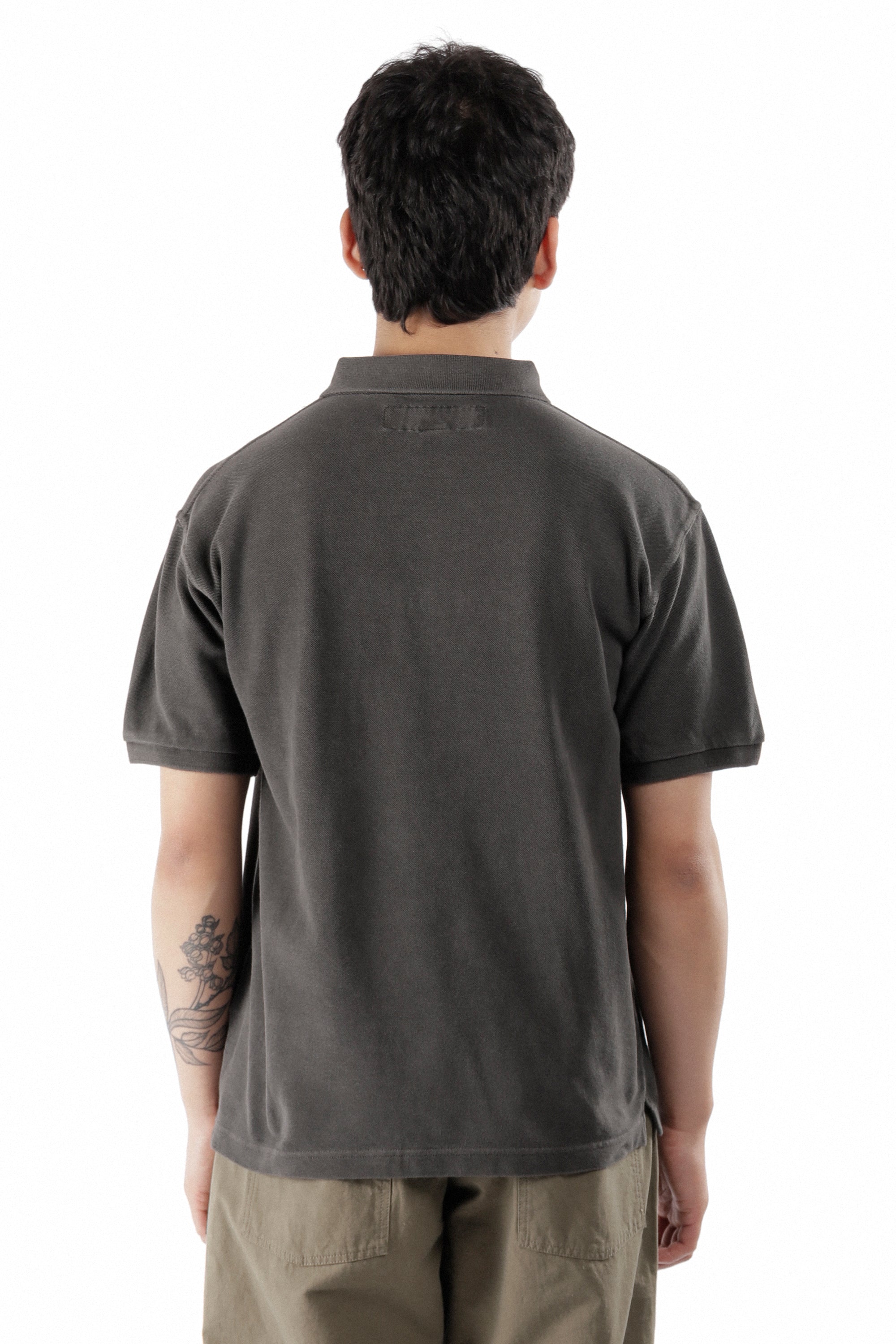 The PIGMENT DYED POLO SS TOP BLACK available online with global shipping, and in PAM Stores Melbourne and Sydney.