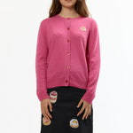 The QUEREMOS PASTELES TARTLETTE PINK CARDIGAN available online with global shipping, and in PAM Stores Melbourne and Sydney.
