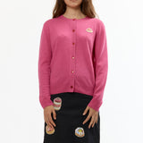 The QUEREMOS PASTELES TARTLETTE PINK CARDIGAN available online with global shipping, and in PAM Stores Melbourne and Sydney.