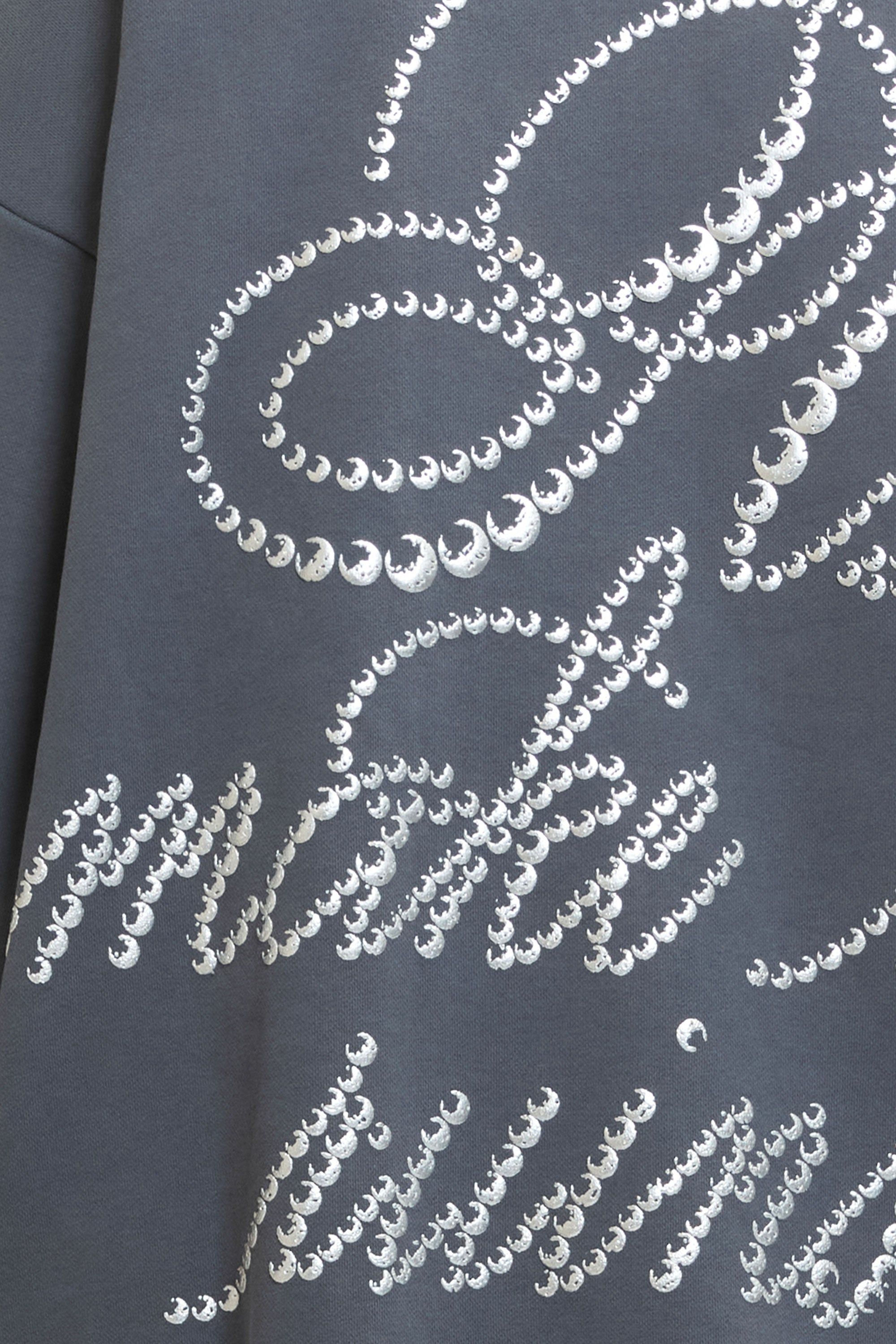 The STUD CREWNECK available online with global shipping, and in PAM Stores Melbourne and Sydney.