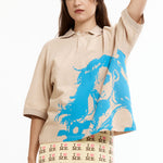 The MANGA POLO SHIRT BEIGE available online with global shipping, and in PAM Stores Melbourne and Sydney.