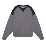 The PANEL SHOULDER CREW NECK CHARCOAL  available online with global shipping, and in PAM Stores Melbourne and Sydney.