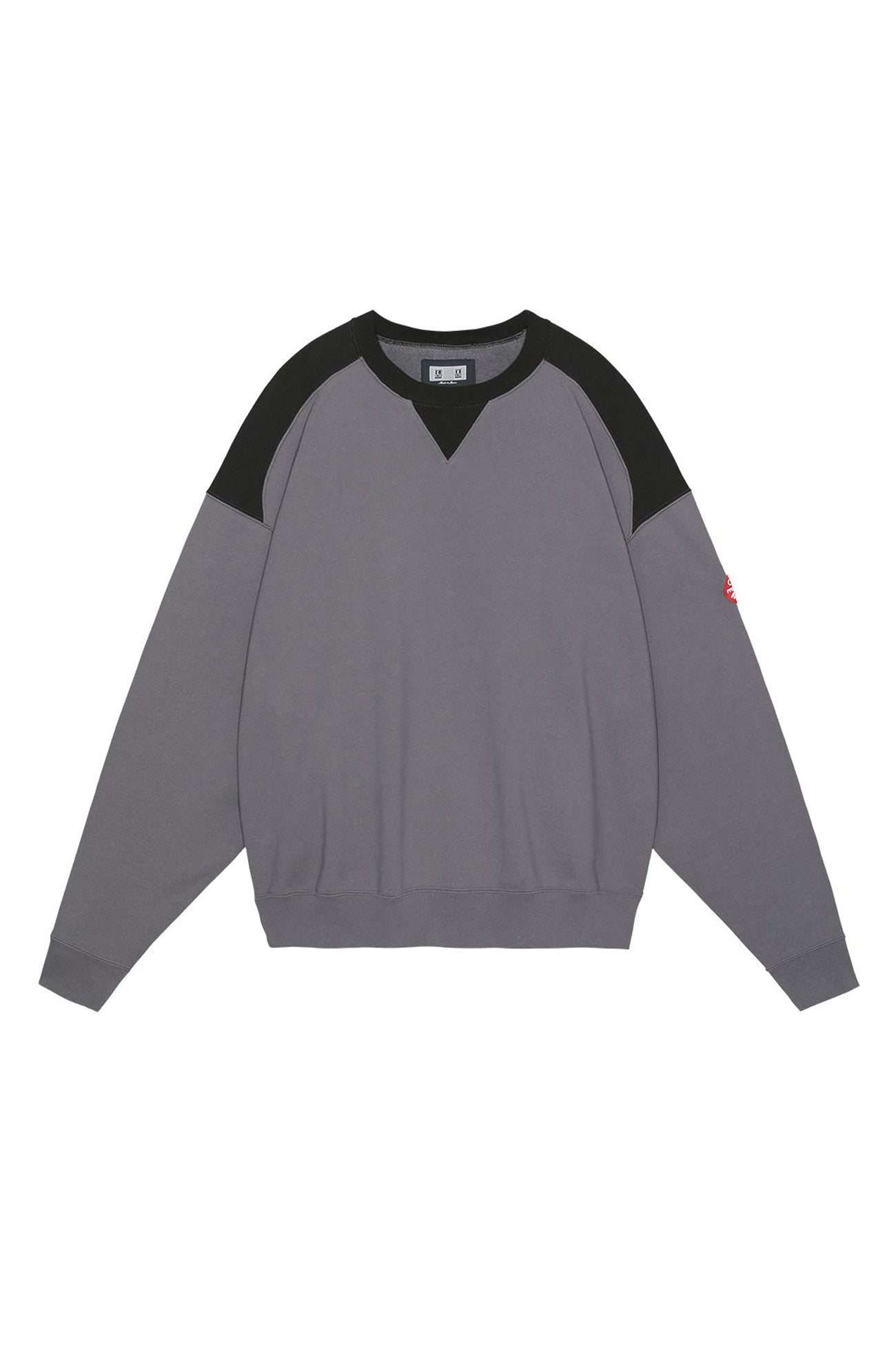 The PANEL SHOULDER CREW NECK CHARCOAL  available online with global shipping, and in PAM Stores Melbourne and Sydney.