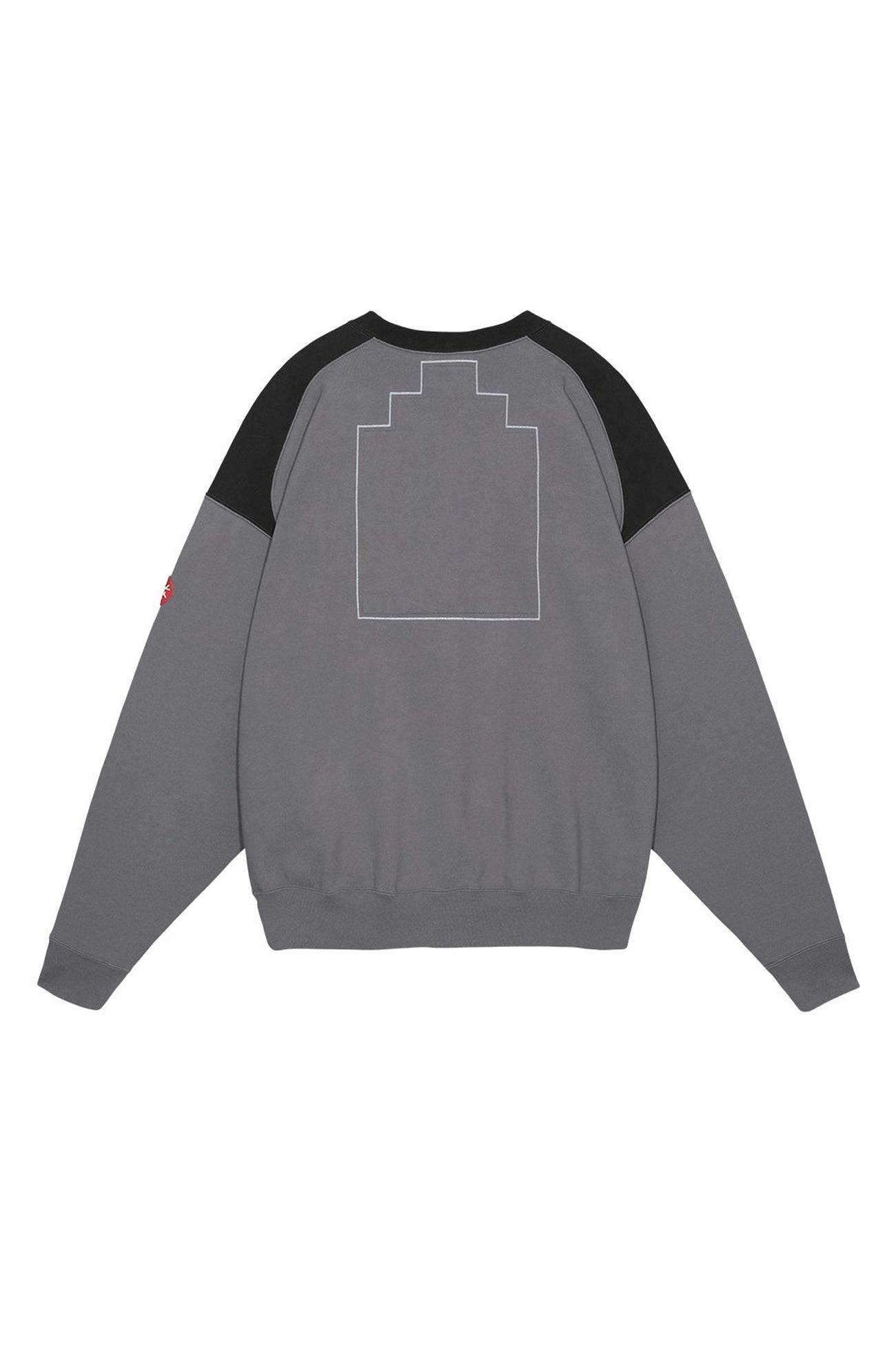 The PANEL SHOULDER CREW NECK CHARCOAL  available online with global shipping, and in PAM Stores Melbourne and Sydney.