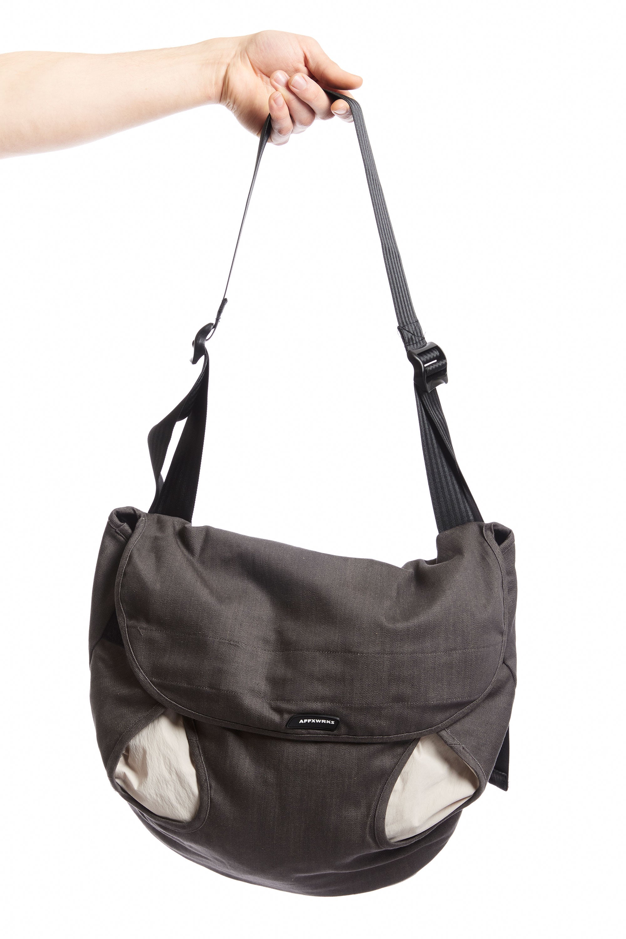 The RABIN MESSENGER BAG TAN GREY LITE SAND  available online with global shipping, and in PAM Stores Melbourne and Sydney.