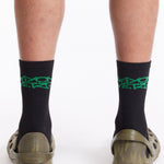 The GOLGOTHA BLACK PROBLEM SOCKS available online with global shipping, and in PAM Stores Melbourne and Sydney.