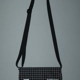 The REFLECTIVE MINI SHOULDER BAG available online with global shipping, and in PAM Stores Melbourne and Sydney.