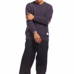 The SAVAGE CREWNECK KNITTED SWEATER NAVY available online with global shipping, and in PAM Stores Melbourne and Sydney.