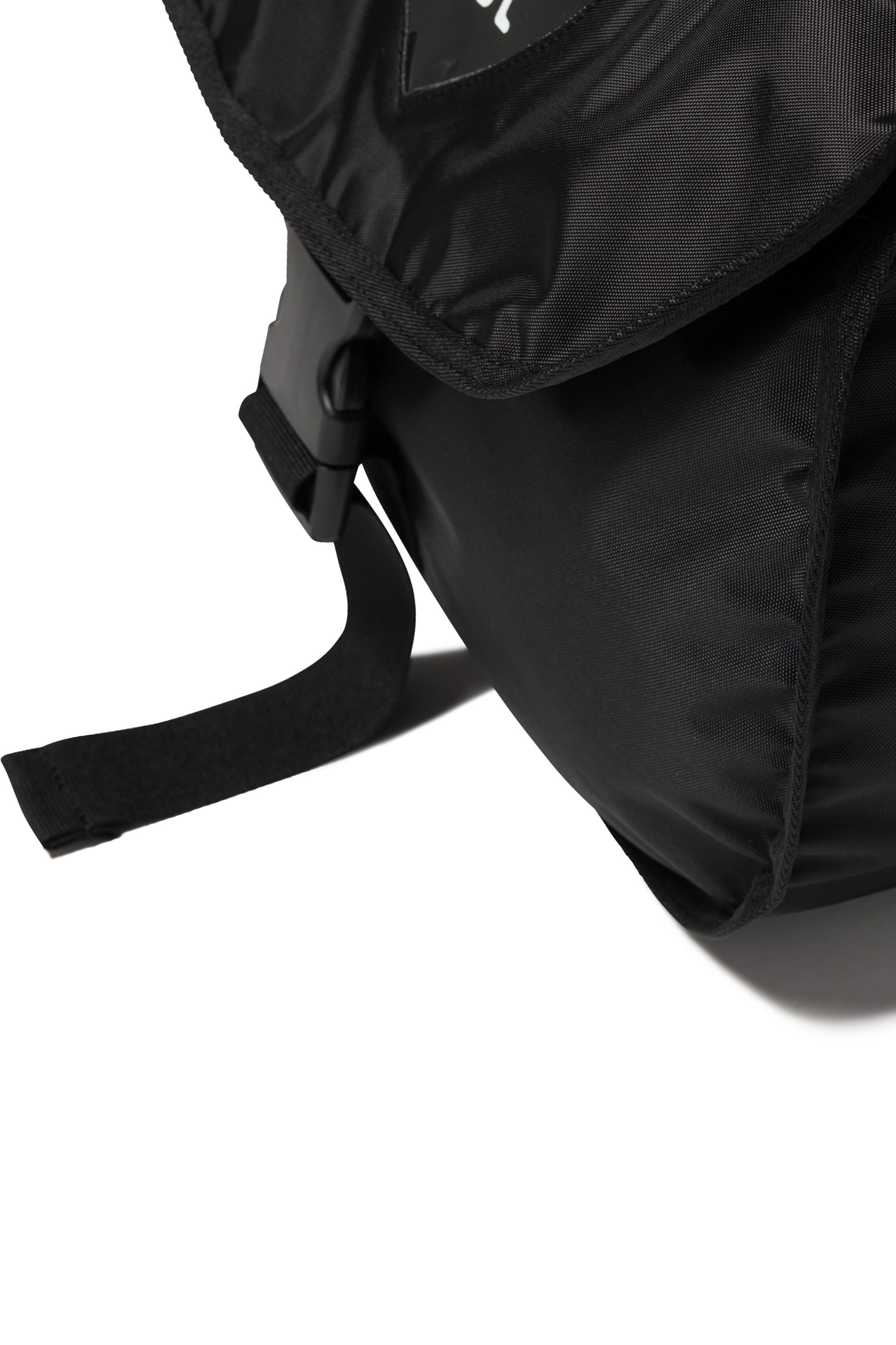 The BUCKLE SHOULDER BAG BLACK available online with global shipping, and in PAM Stores Melbourne and Sydney.