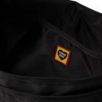 The BUCKLE SHOULDER BAG BLACK available online with global shipping, and in PAM Stores Melbourne and Sydney.