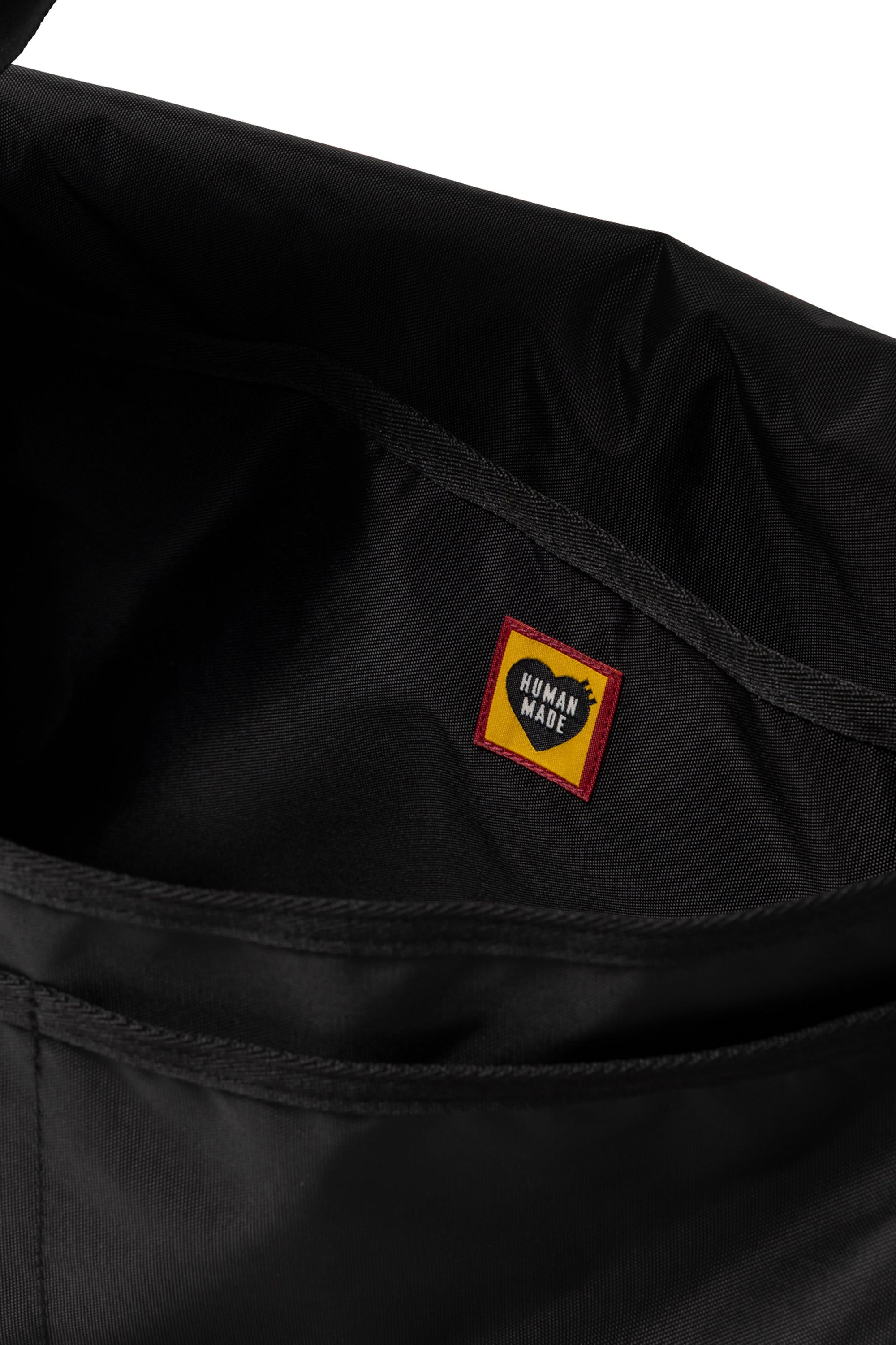 The BUCKLE SHOULDER BAG BLACK available online with global shipping, and in PAM Stores Melbourne and Sydney.