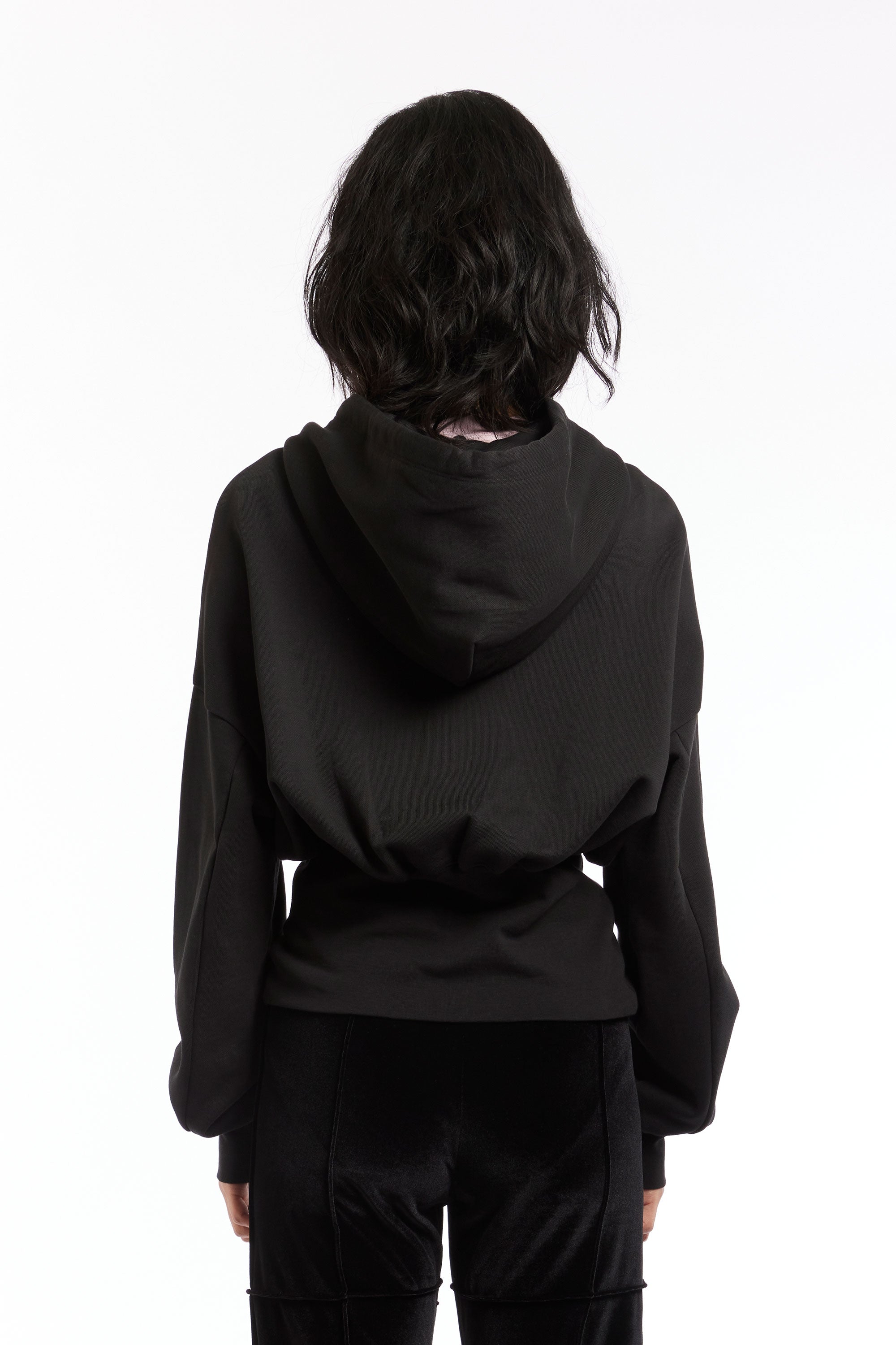 The ECKHAUS LATTA - SNATCHED HOODIE BLACK  available online with global shipping, and in PAM Stores Melbourne and Sydney.