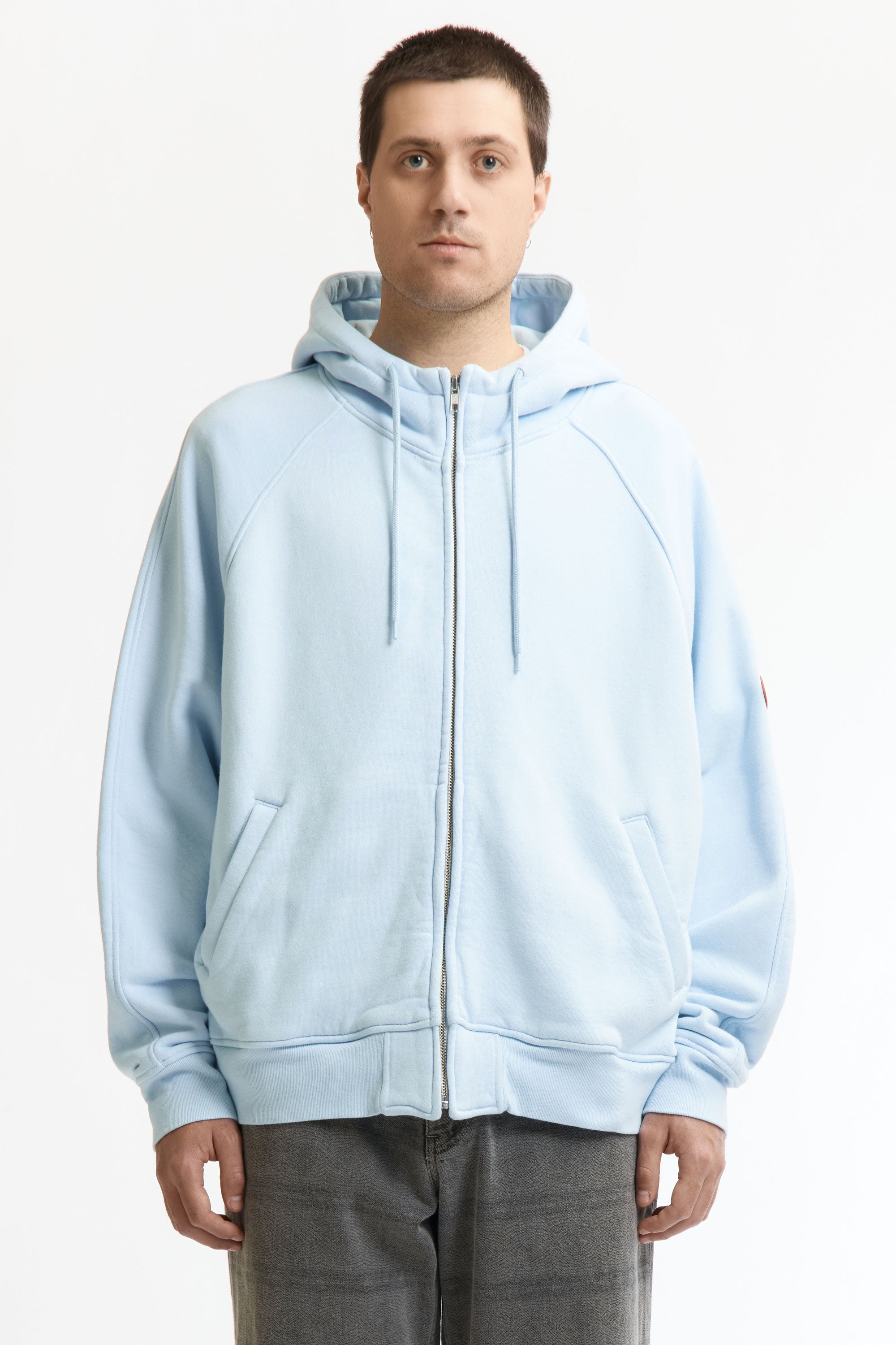 The SOLID BIG HEAVY ZIP HOODY BLUE available online with global shipping, and in PAM Stores Melbourne and Sydney.