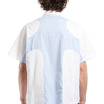 The Angel99 2.0 Button Up T-Shirt Blue  available online with global shipping, and in PAM Stores Melbourne and Sydney.