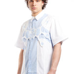 The Angel99 2.0 Button Up T-Shirt Blue  available online with global shipping, and in PAM Stores Melbourne and Sydney.