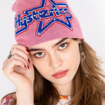 The STAR LOGO STUDDED BEANIE PINK available online with global shipping, and in PAM Stores Melbourne and Sydney.