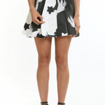 The Shooting Star Flip Pleat Mini Skirt available online with global shipping, and in PAM Stores Melbourne and Sydney.