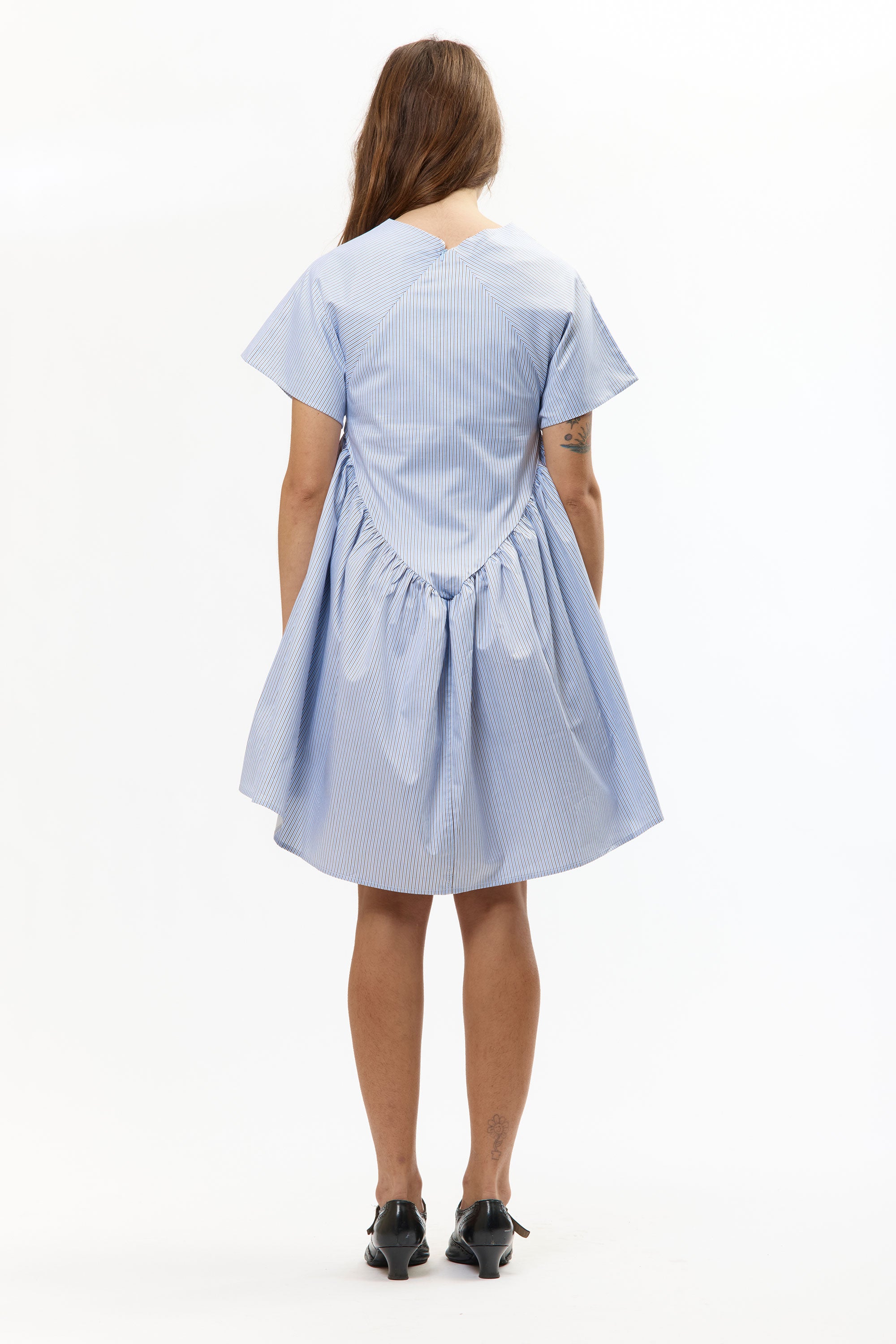 The PINSTRIPE DIAMOND BABYDOLL DRESS (BIAS CUT) available online with global shipping, and in PAM Stores Melbourne and Sydney.
