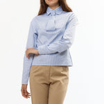 The PINSTRIPE FAUX TIE BLOUSE available online with global shipping, and in PAM Stores Melbourne and Sydney.