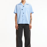 The FLOATING HEART SS SHIRT BLUE available online with global shipping, and in PAM Stores Melbourne and Sydney.