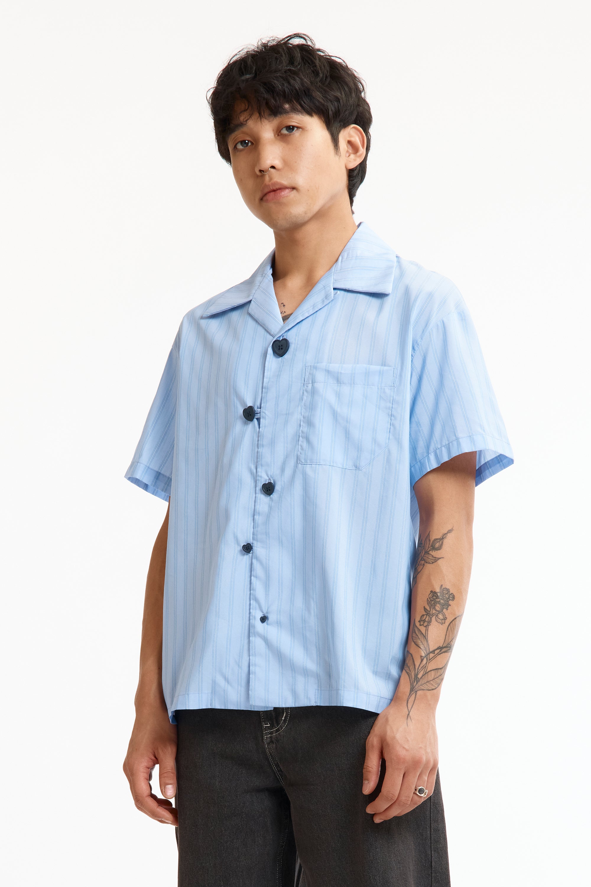 The FLOATING HEART SS SHIRT BLUE available online with global shipping, and in PAM Stores Melbourne and Sydney.
