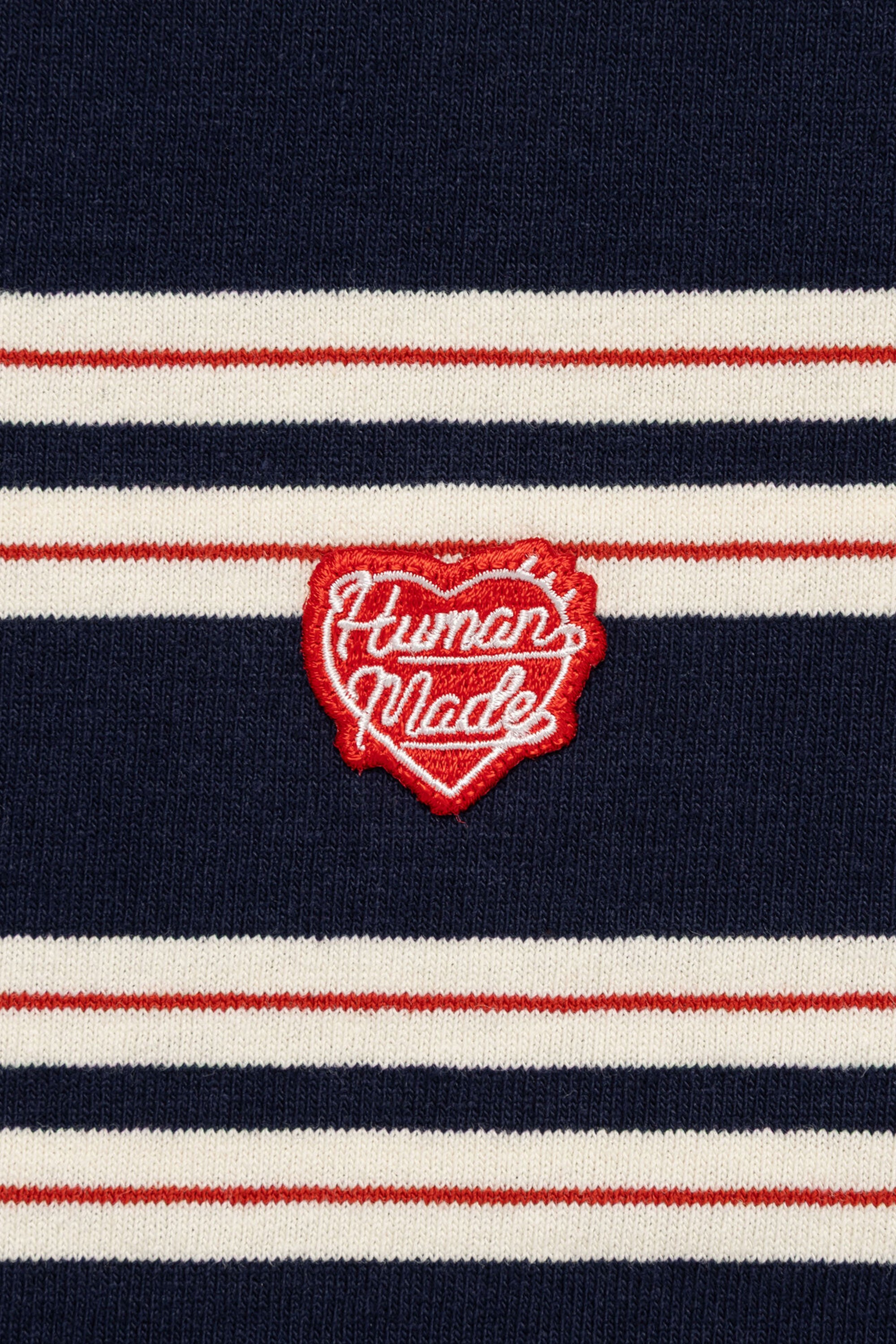 The STRIPED T-SHIRT NAVY available online with global shipping, and in PAM Stores Melbourne and Sydney.