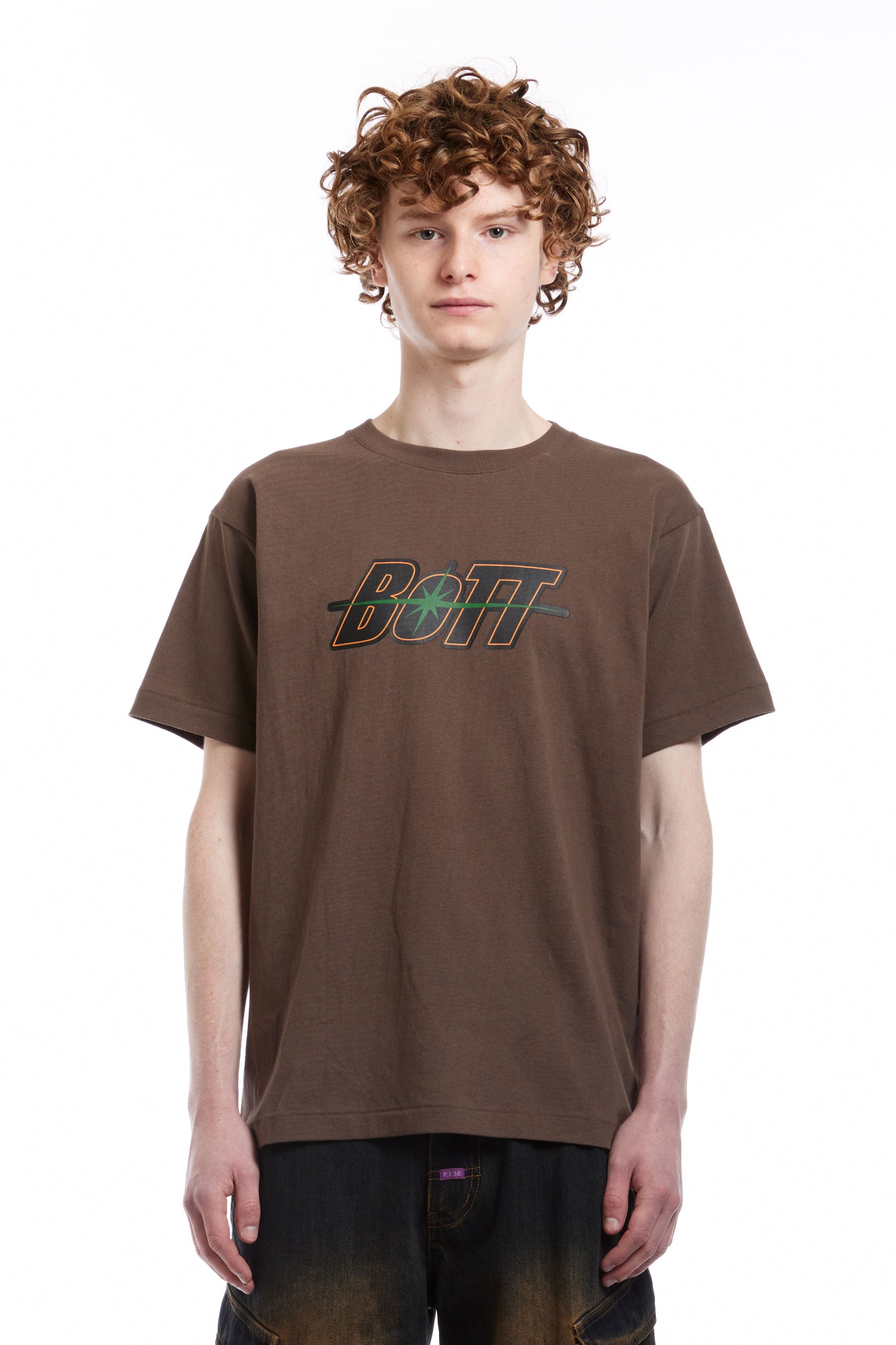 The BOTT - SPACE LOGO TEE BROWN  available online with global shipping, and in PAM Stores Melbourne and Sydney.